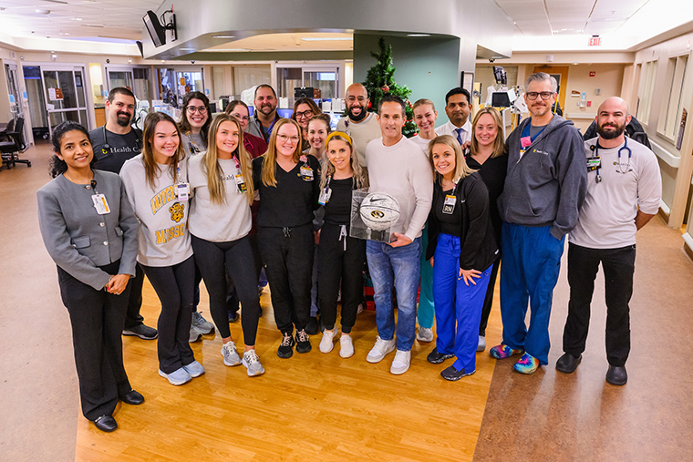 Dan Rolfes returned to MU Health Care to thank his care team before his team’s season-opening basketball game.