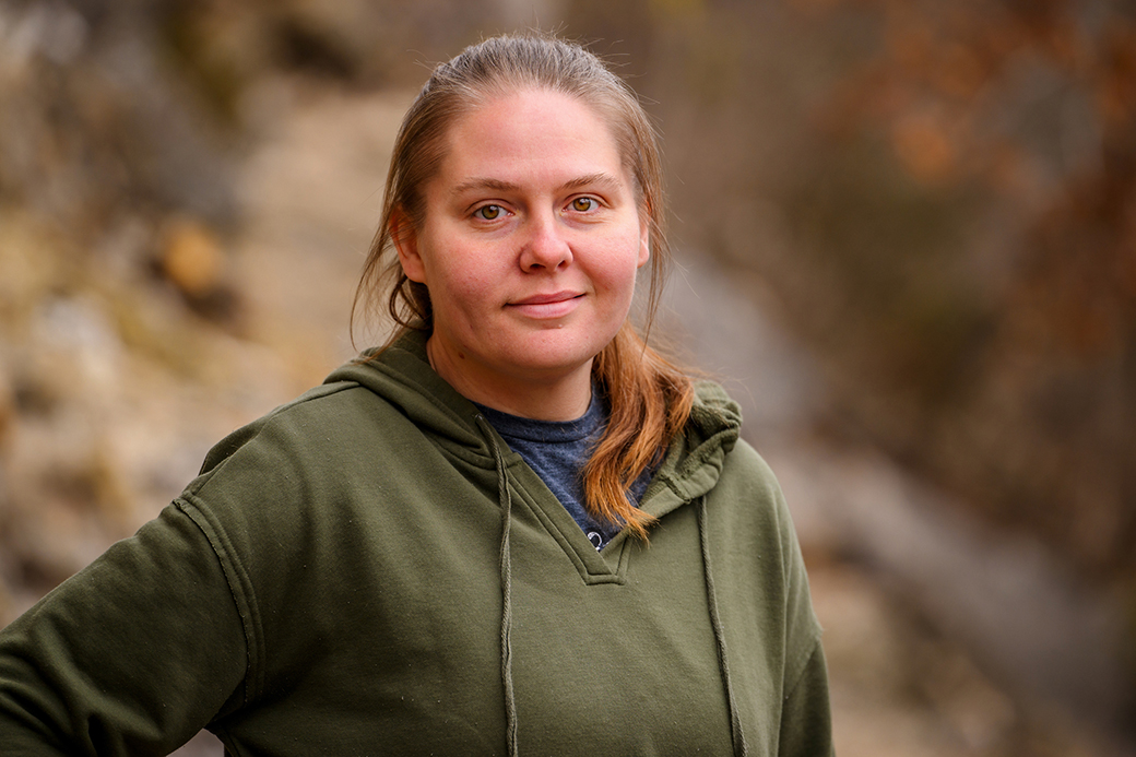 A photo of a woman outdoors.