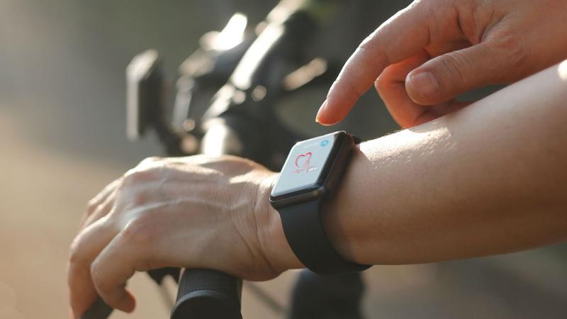 Person monitoring their heart rate on their watch