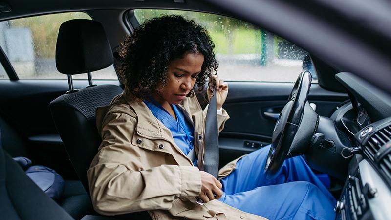 nurse in car