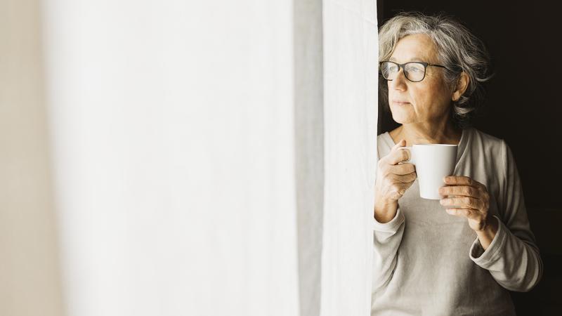 A woman holding a mug.