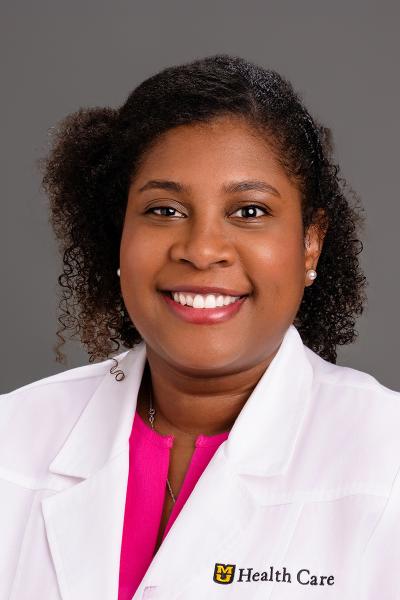 July Jean Cuevas, MD headshot