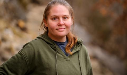 A photo of a woman outdoors.