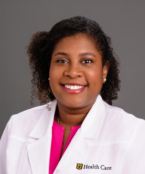 July Jean Cuevas, MD headshot