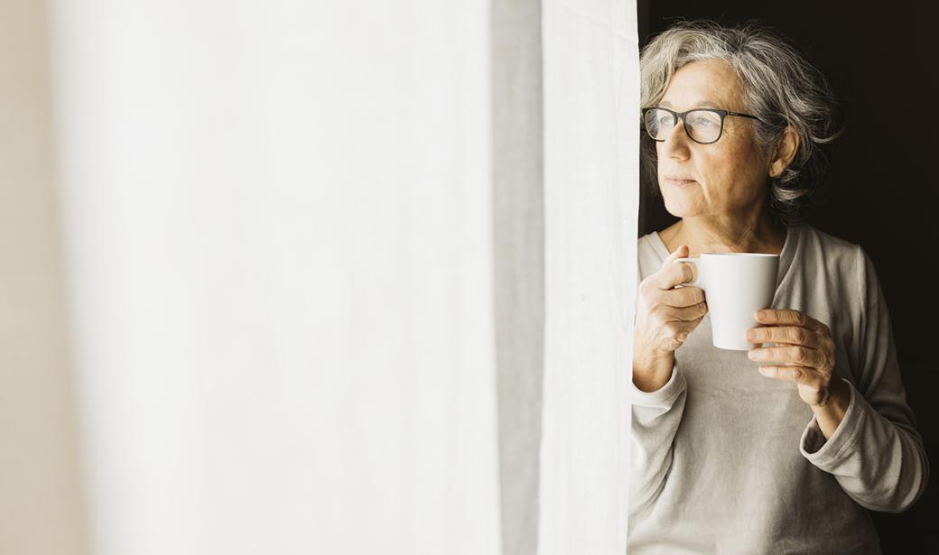 A woman holding a mug.