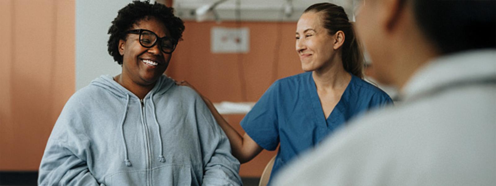 Doctor talking with patient